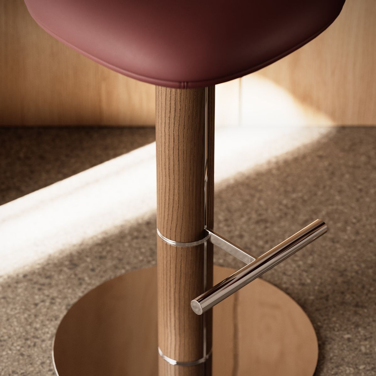 Hiro bar chair by Domkapa A stylish stool with a durable metal base and a striking red seat, ideal for adding a pop of colour to any space.