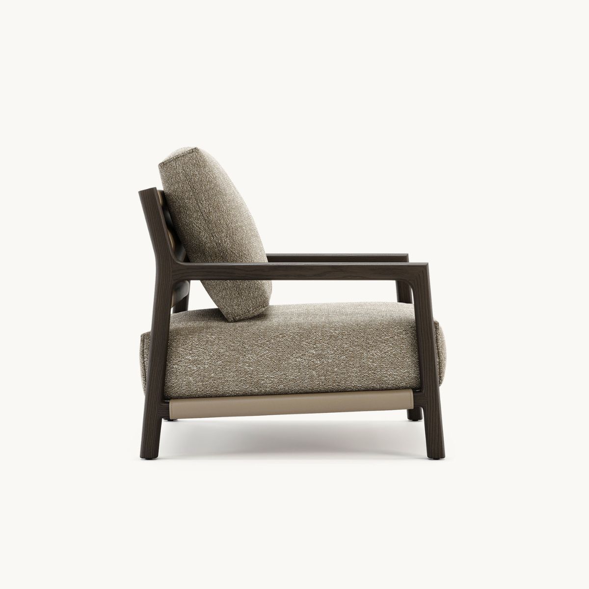Alton armchair by Domkapa with a brown upholstered seat, designed for comfort and style.