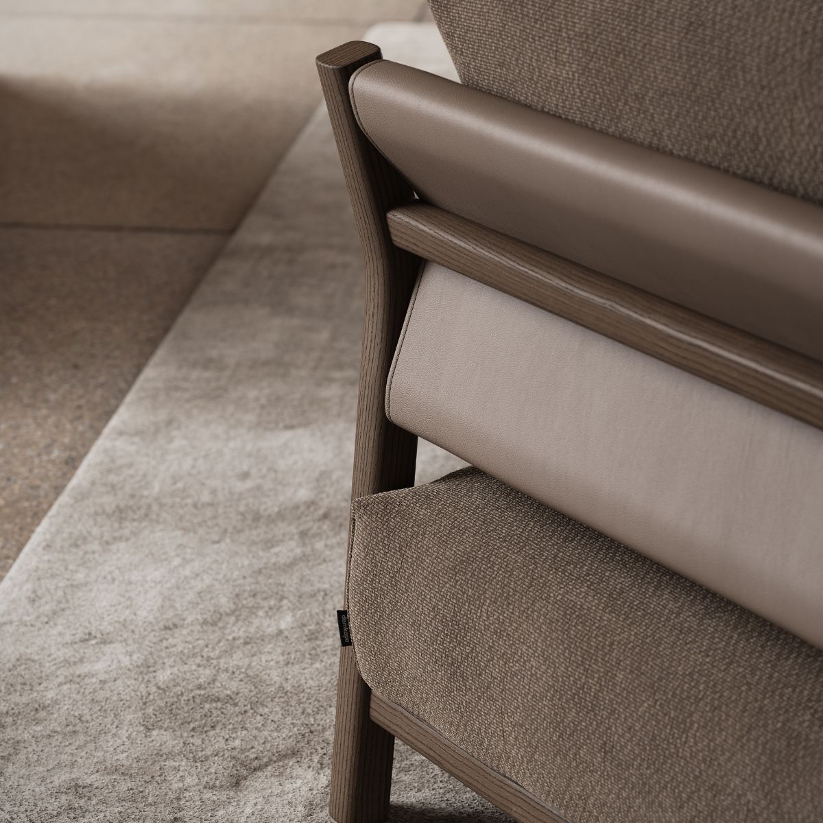 Detailed view of an armchair with a smooth brown leather seat, showcasing its elegant design and quality material.