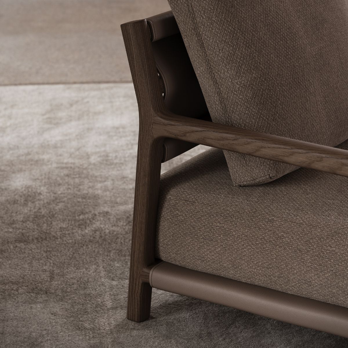 Close-up of a wooden-framed armchair, showcasing its craftsmanship and design details.
