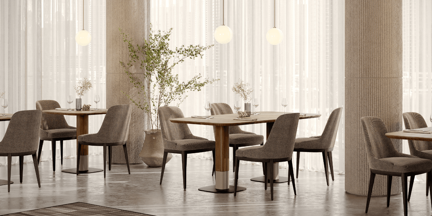 Restaurant interior with grey armless chairs and simple tables in a minimalist setting.