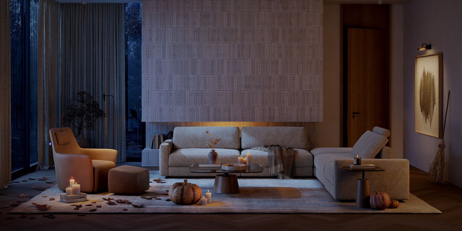 A cosy halloween living room with modern furniture, featuring two sofas and an armchair. Candles and small pumpkins are placed on the tables and floor. Warm lighting and autumn leaves create a relaxing fall ambiance with a large window and curtains in the background.