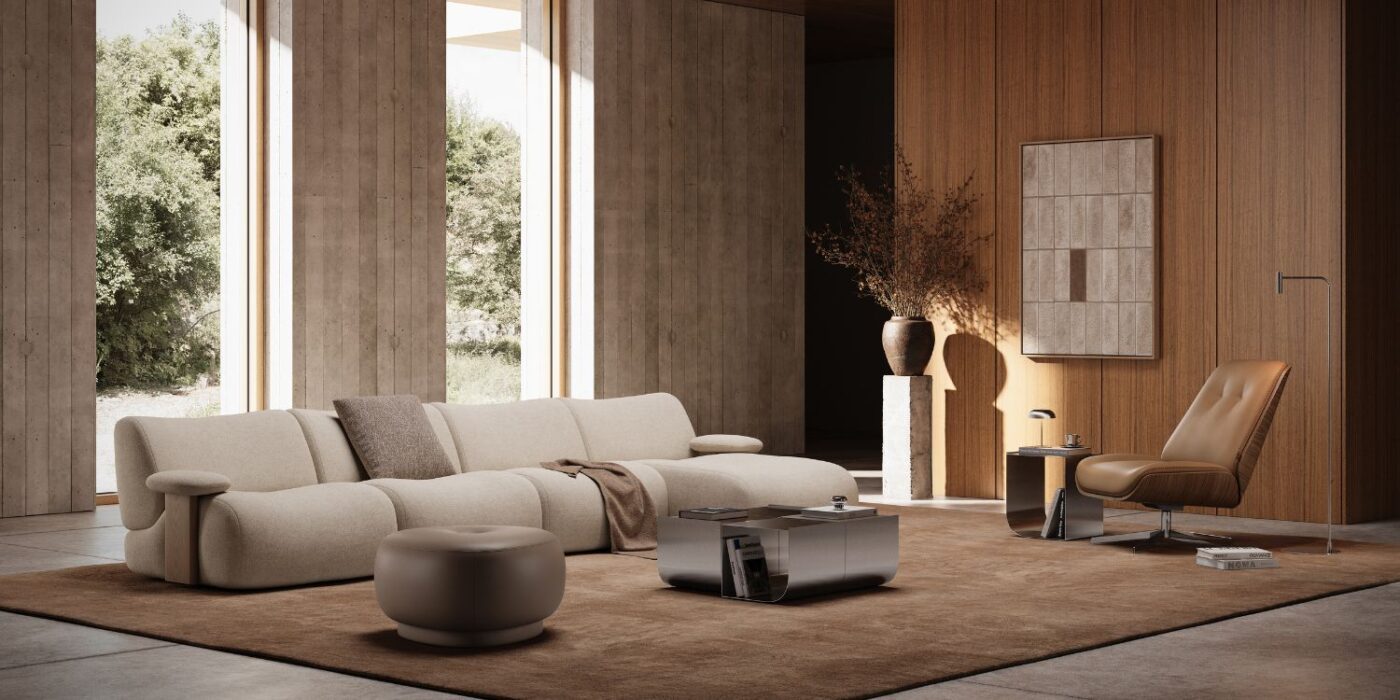 Blog Featured Image - 2026-04-28T153348.511 Modern living room showcasing a sofa, an armchair and a pouf, designed for comfort and socialising.