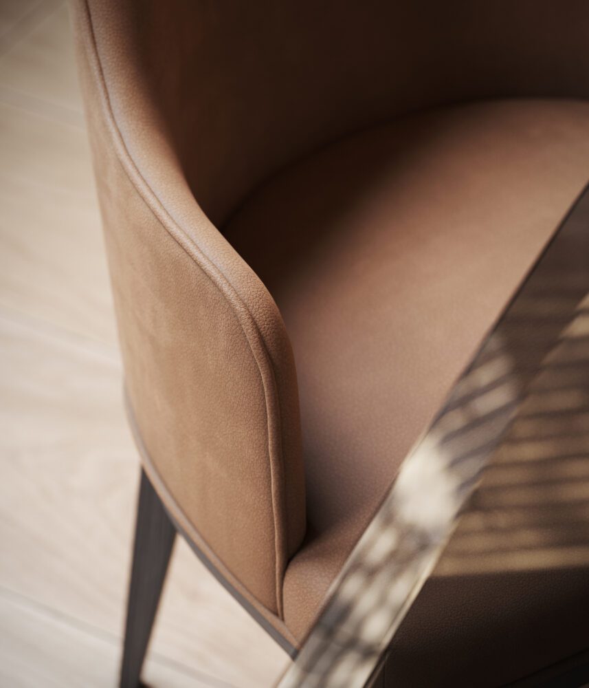 Close up of the arm of dining chair Two stylish dining chairs face a table adorned with a lovely vase, perfect for a relaxed setting. Perfect for minimalist dining rooms.