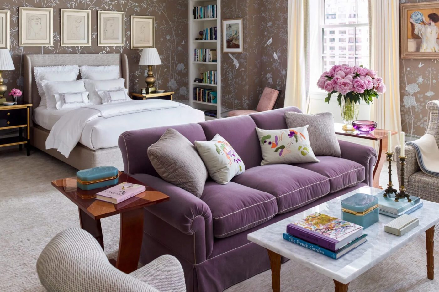 Culman & Kravis Associates Bedroom project with brown and purple tones. With a purple sofa and a neutral toned bed. Designed by Cullman & Kravis Associates