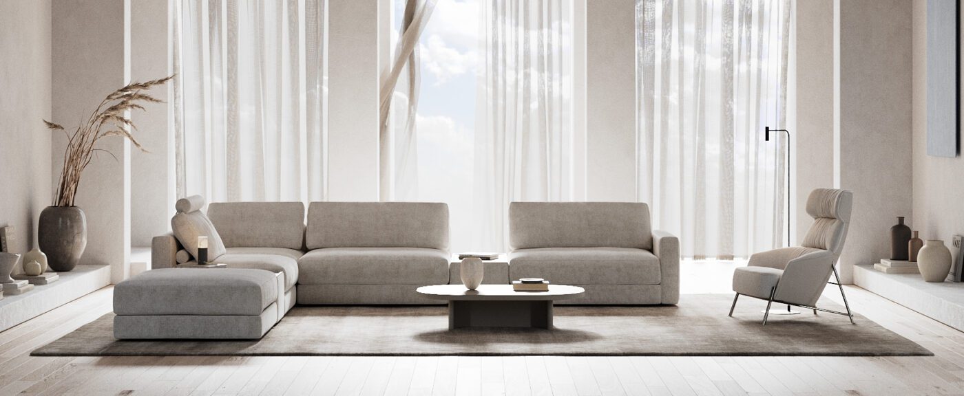 DK25 - PANTONE 2026 - 02 - H A stylish living room with a modular sofa, an armchair and a coffee table, creating an inviting space for leisure and conversation. In PANTONE 11-4201 Cloud Dancer, a billowy white imbued with a feeling of serenity: the Pantone Color of the Year selection for 2026.