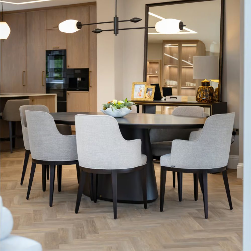 Dining room by Rossi Studio with Anna chair