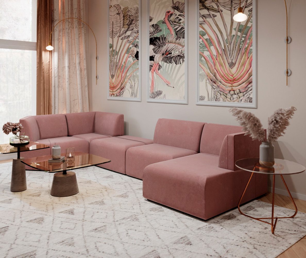 Disruption Sofa in pink (1) A bright living room showcasing a pink modular sofa alongside a colorful painting, enhancing the room's aesthetic appeal.