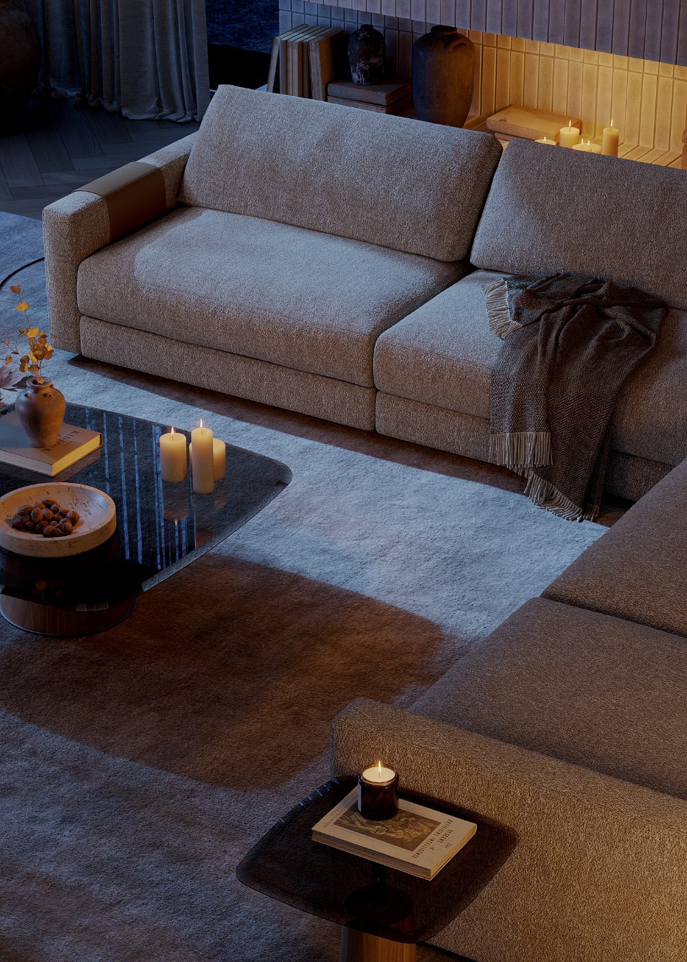 Edward Sofa halloween modular sofa in neutral tones with a cosy blanket. A coffee and side table in glass and wood with candles and halloween decorations.