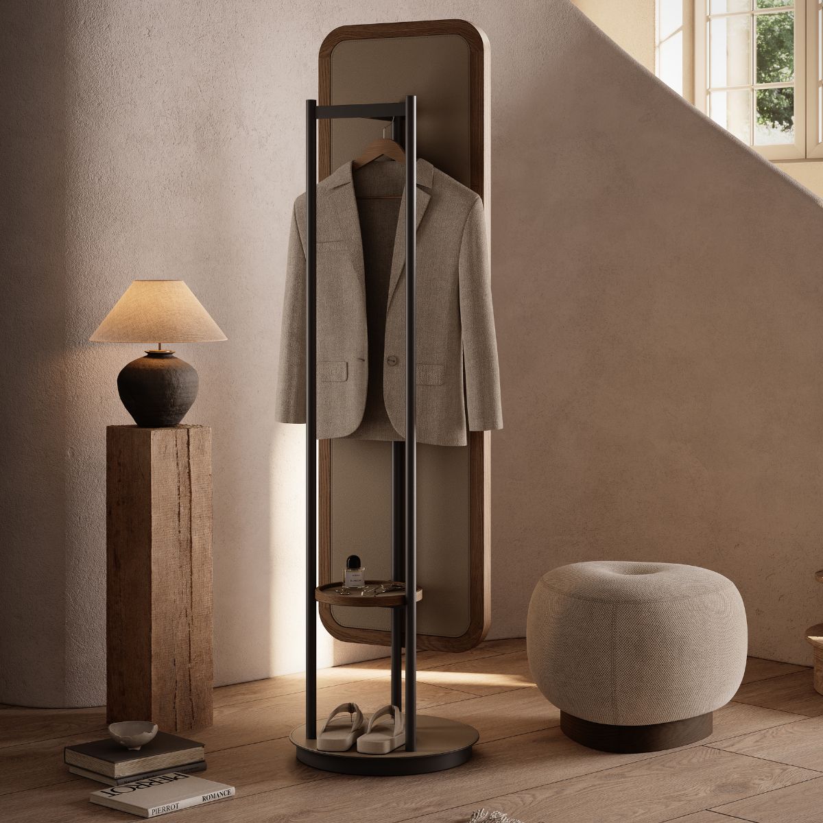 Elise Mirror by Domkapa (3) Amirror with a coat rack and a wooden pouf set in a room, creating a functional area for outerwear and casual seating.