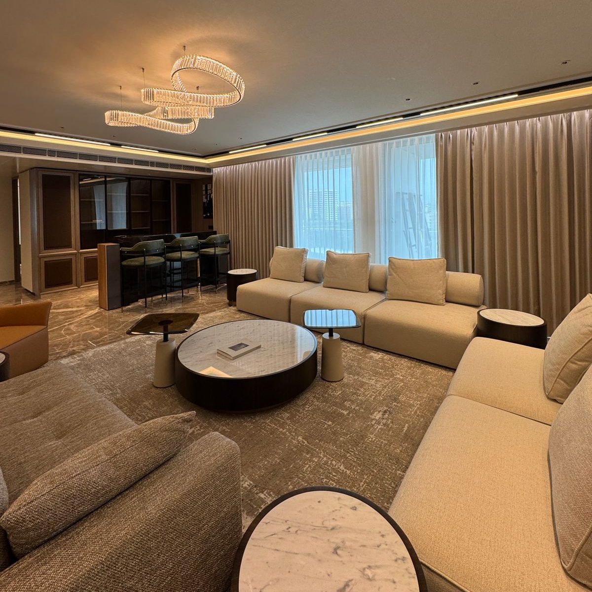 Host project with panton side table A stylish living room with comfortable modular sofa arranged around a coffee table, inviting relaxation and conversation.