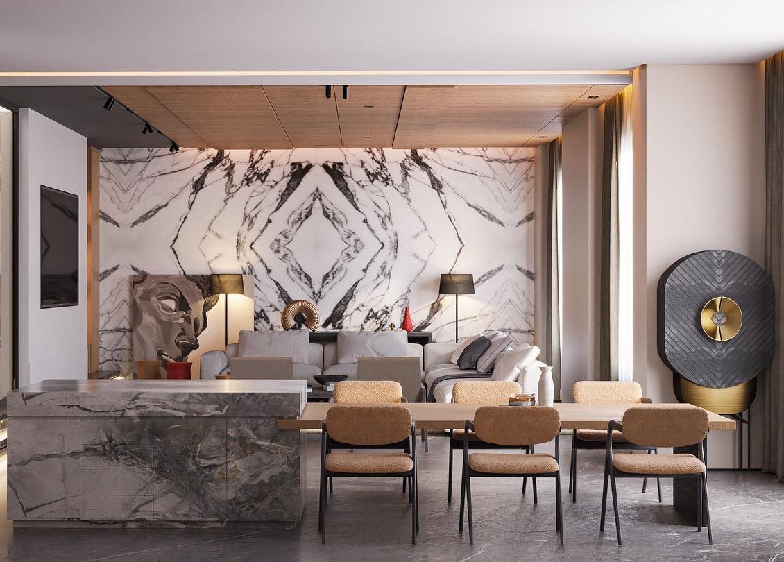 IDEGREE DESIGN Design project by IDEGREE DESIGN with an open space. Living room in neutral tones with marbol wall. Dining table in wood with six dining chairs in yellow, connected to a counter.