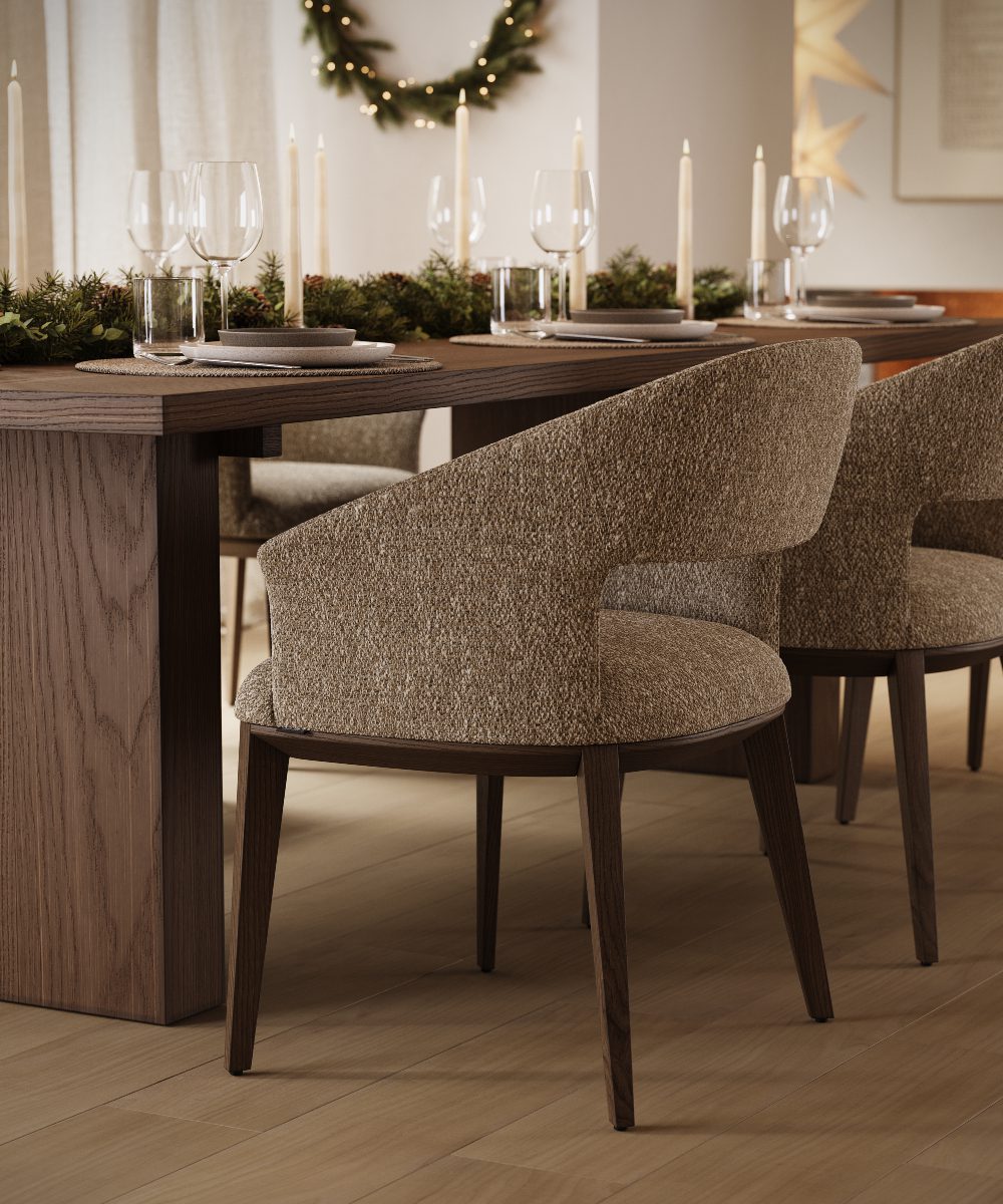 A modern dining room showcasing a sleek table and comfortable dining chairs, inviting for gatherings and Christmas dinner.