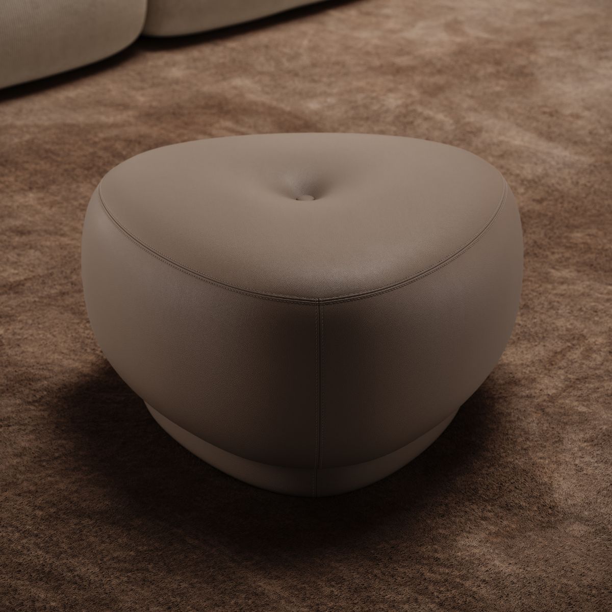 Jules Pouf by Domkapa (1) Small, stylish Jues Pouf situated on a carpeted floor, contributing to the room's inviting atmosphere.