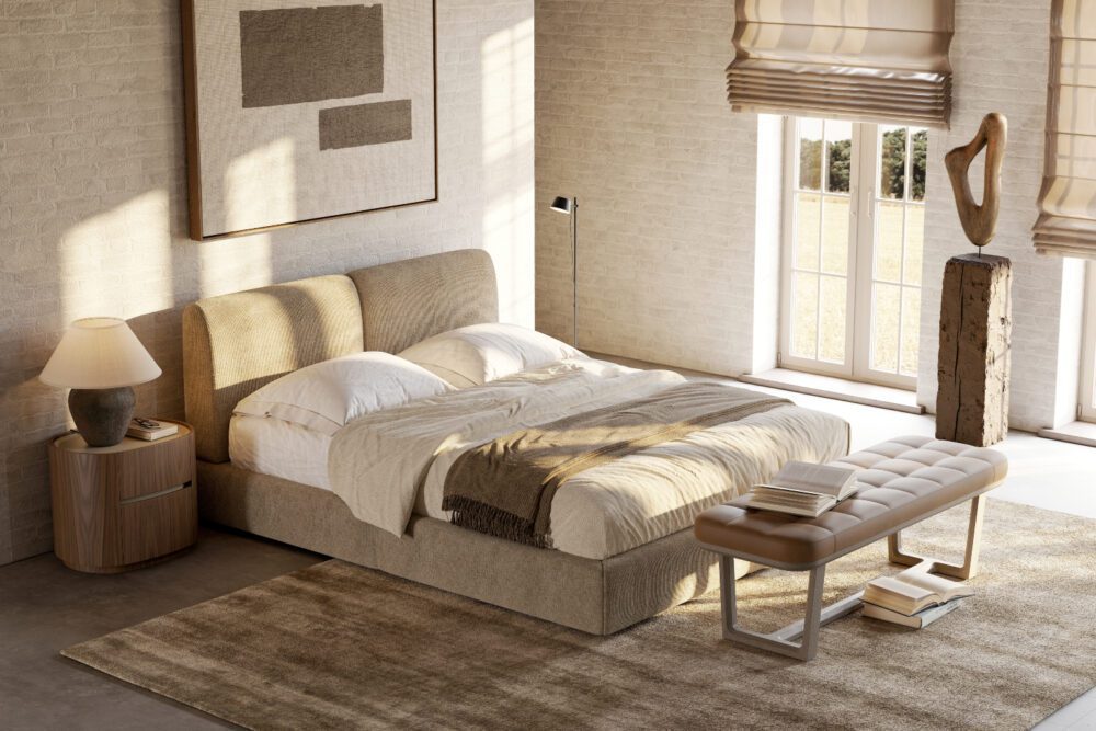 Margot Plus bed and Adeline bedside table A simple bedroom design with a neatly made bed, a table beside it, and a window that opens to the outside.