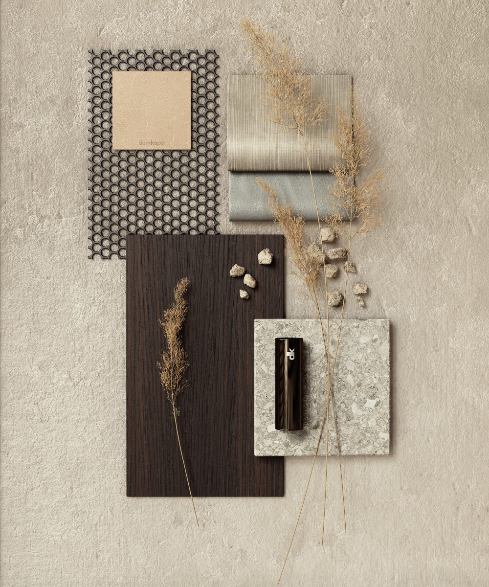 Moodboard with Domkapa materials A mood board, a sheet of paper, and dried grass are displayed together, highlighting a minimalist and organic aesthetic. Furniture colours and fabrics