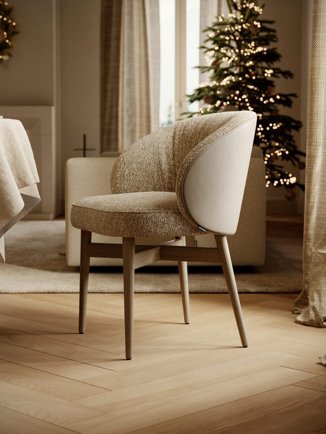 Norah dining chair for christmas by Domkapa A festive scene showcasing a chair next to a Christmas tree, adding warmth and cheer to the room with the spirit of the season.