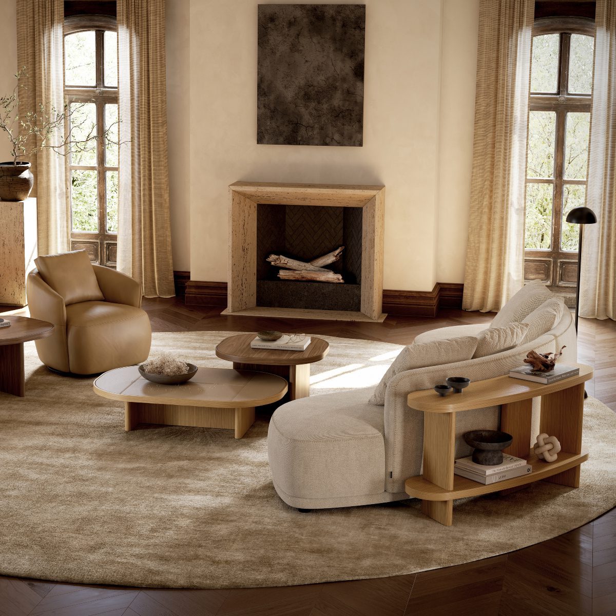 Olivia sofa and Olivia console set A welcoming living room with a fireplace and a round rug, perfect for relaxation and gatherings. With a curved sofa, olivia sofa, complemented by the Olivia Console.