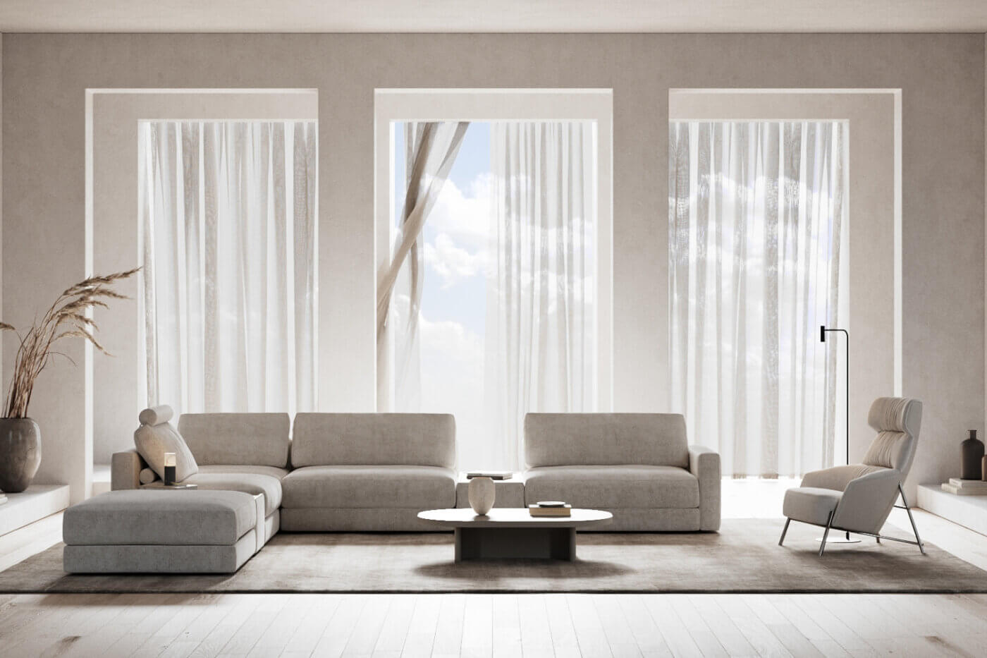 A modern living room showcasing a modular sofa, coffee table and an armchair, designed for comfort and leisure. In Cloud Dancer, one of the interior design trends for 2026