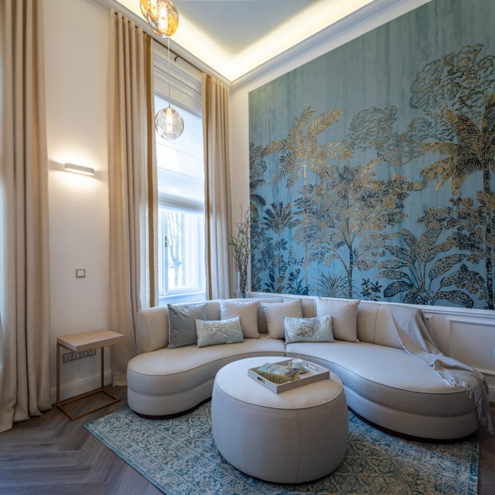 Rachel Pouf in La Fenice Interiors Project Living room with stella sofa in white and rachel pouf also in white. The pouf is placed in front of the sofa and it's doing the coffee table job.