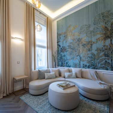 Rachel Pouf in La Fenice Interiors Project Living room with stella sofa in white and rachel pouf also in white. The pouf is placed in front of the sofa and it's doing the coffee table job.