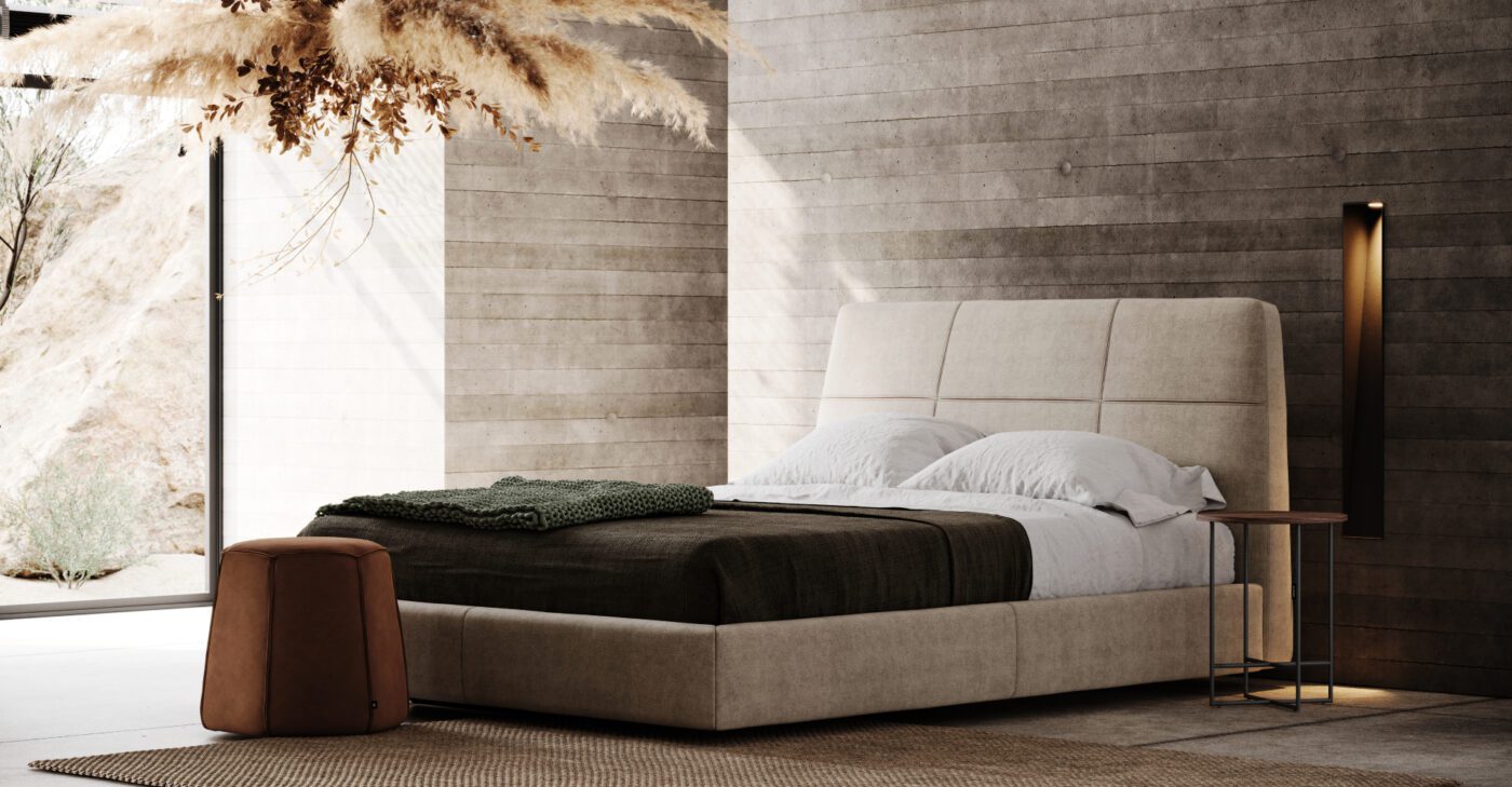 Shelby bed and angles pouf from 2022 A cosy bedroom featuring a bed with a stylish headboard and a matching pouf, creating a welcoming atmosphere.