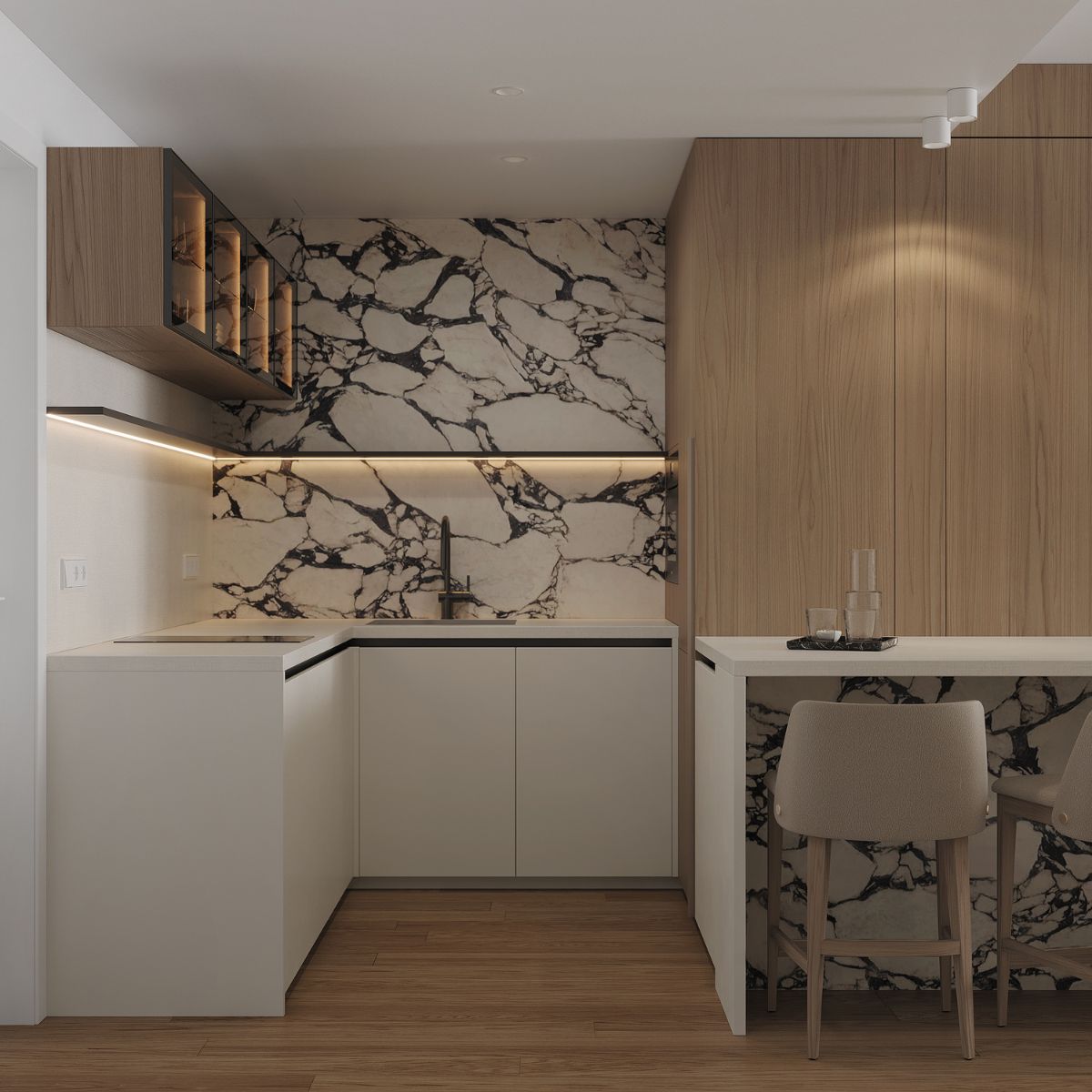 White home project in Slovakia (1) Modern kitchen with white cabinets and dramatic black-veined marble backsplash. Warm wood accents, under-cabinet lighting, and two cushioned bar stools create an elegant, cosy atmosphere.