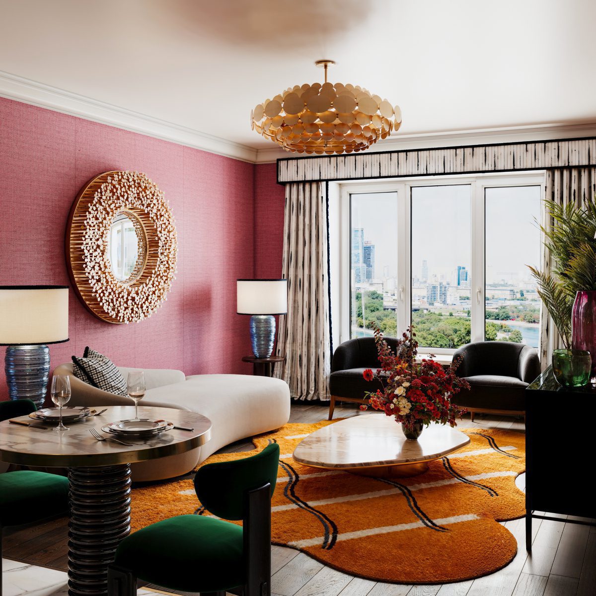 Zhk Zilart by Viktor 1 Design Stories: A spacious living room featuring a coffee table surrounded by armchairs and a sofa.