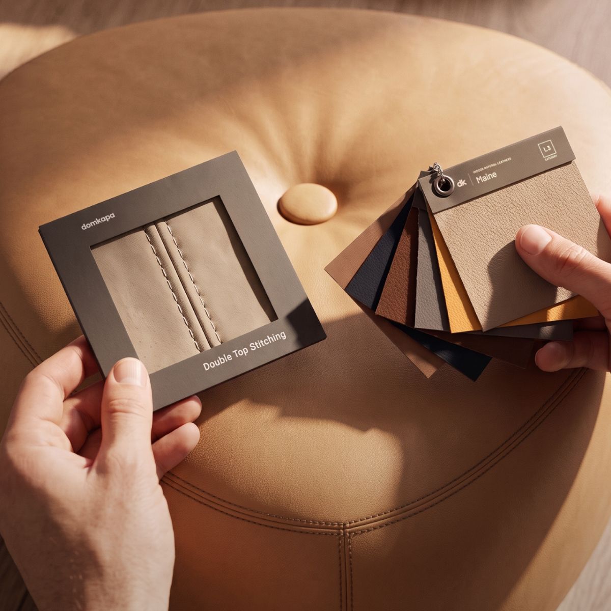 blog article about upholstery finishes by domkapa (1) Individual displaying a colour swatch and stitch swatch next to a chair, considering colour choices for home decor.