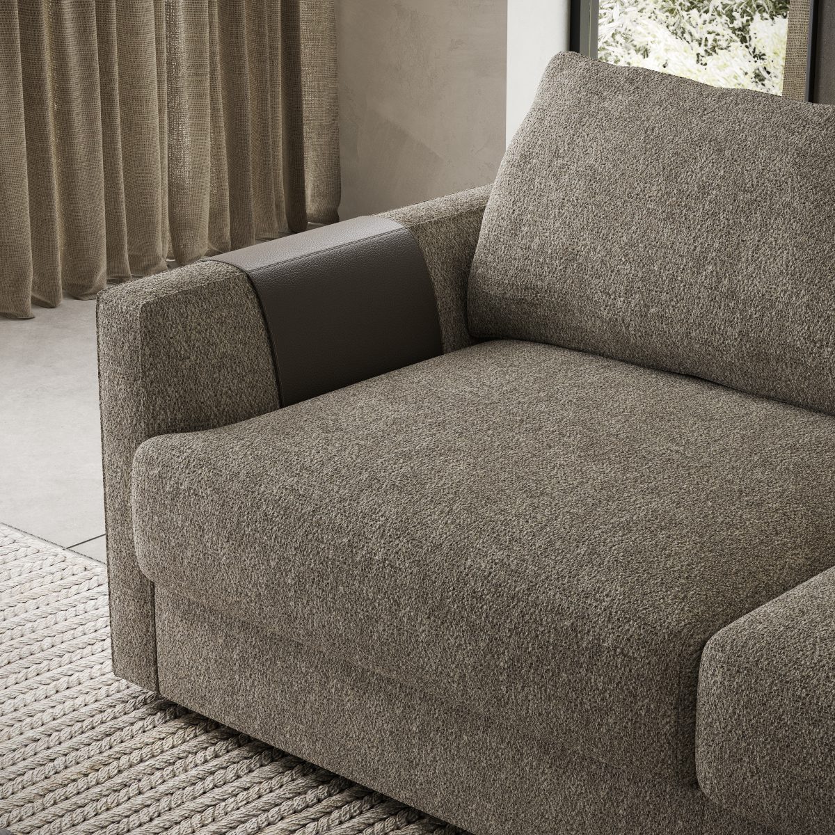 A contemporary sofa bed with a prominent brown leather magazine racks, adding elegance to the seating area.