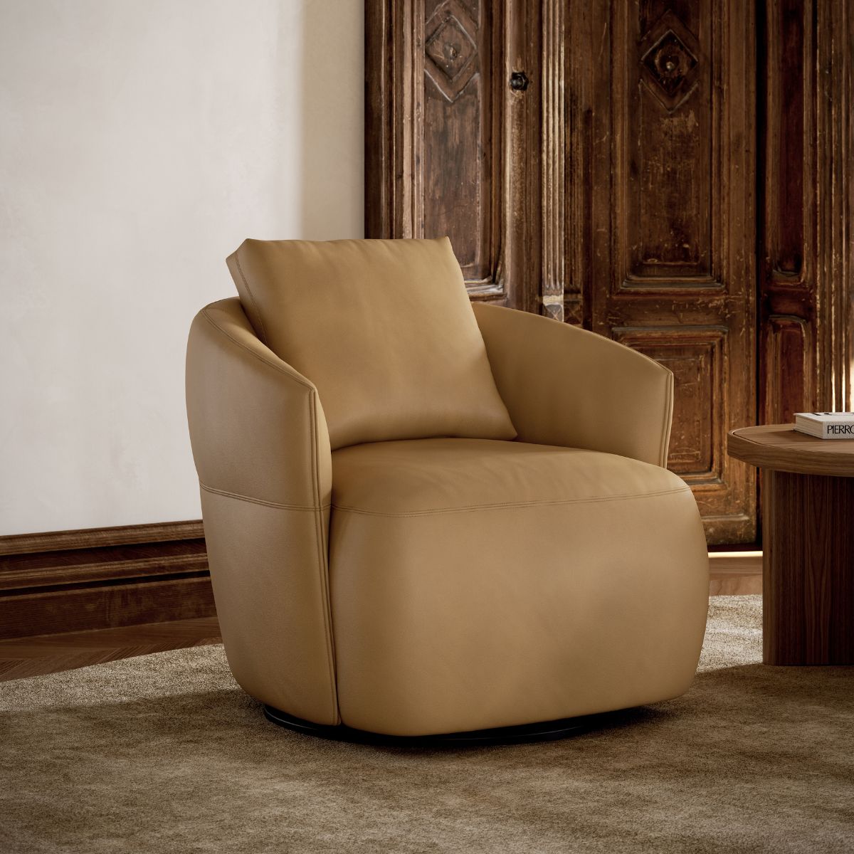 danish interior design (3) A cosy tan leather armchair is set on a plush beige carpet, beside a wooden coffee table. The background features an ornate wooden door, creating a warm, inviting ambiance.