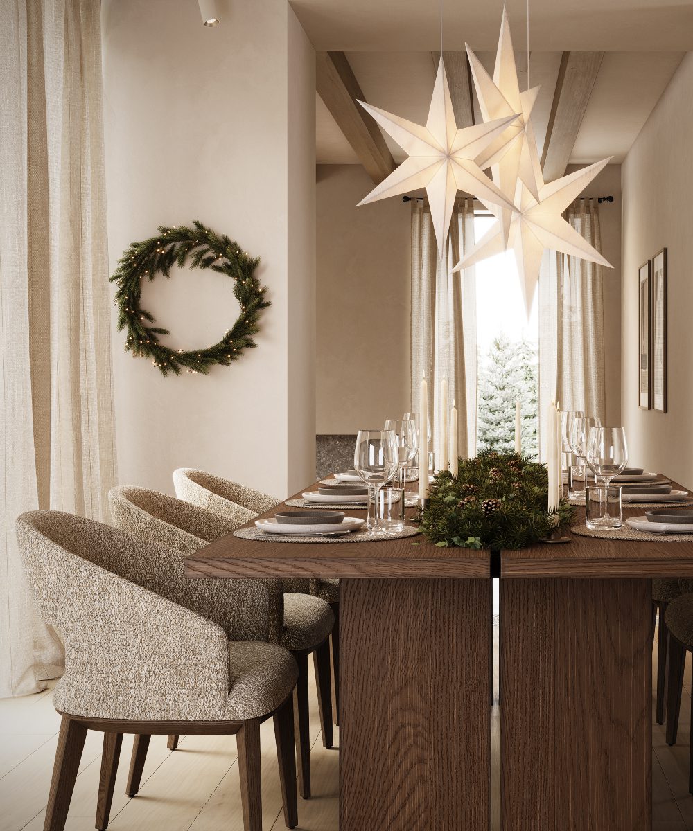 A rectangular dining room table with a tablecloth, plates, and cutlery, positioned in a bright dining space.