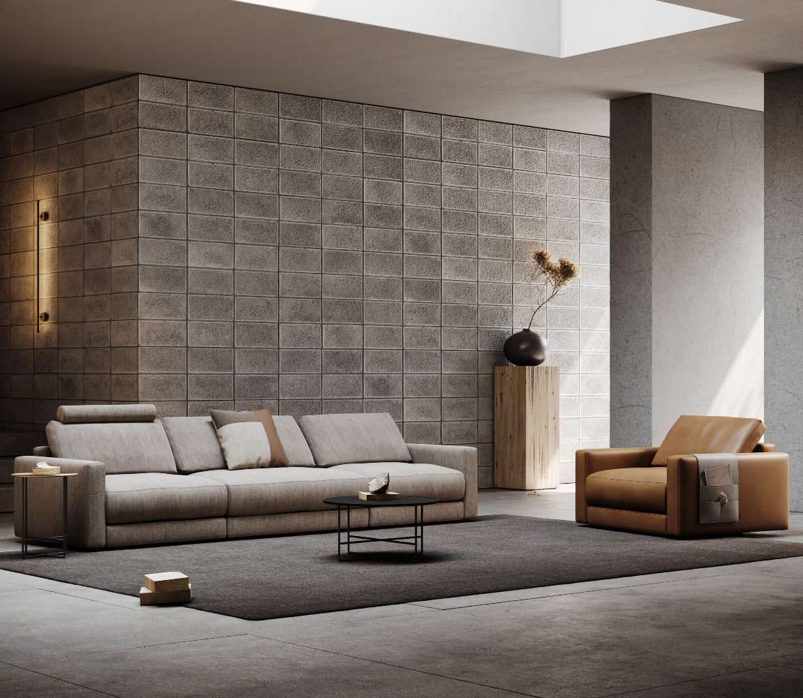 edward modular sofa and armchair A modern social space design featuring a large modular sofa and armchair arranged for comfort and relaxation.