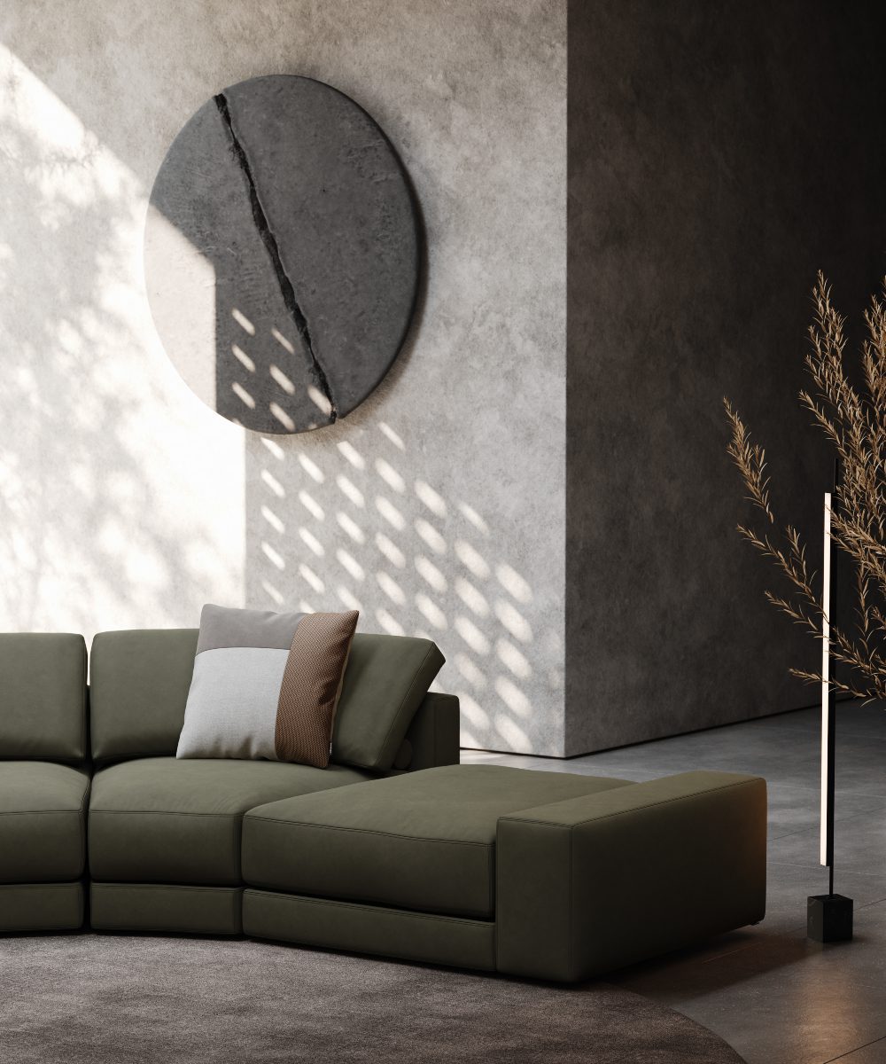 edward modular sofa and diagonal lines A modern living room featuring a large round wall art with a diagonal line on the wall, with stylish furniture and decor.