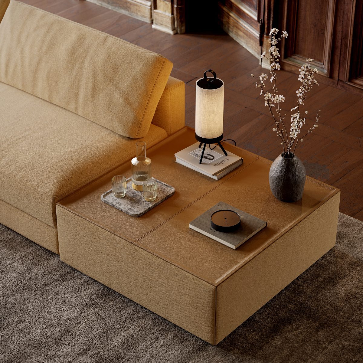 edward sofa side table in a living room A modern sofa featuring a table and a lamp on it, adding elegance to the living area. Café core.