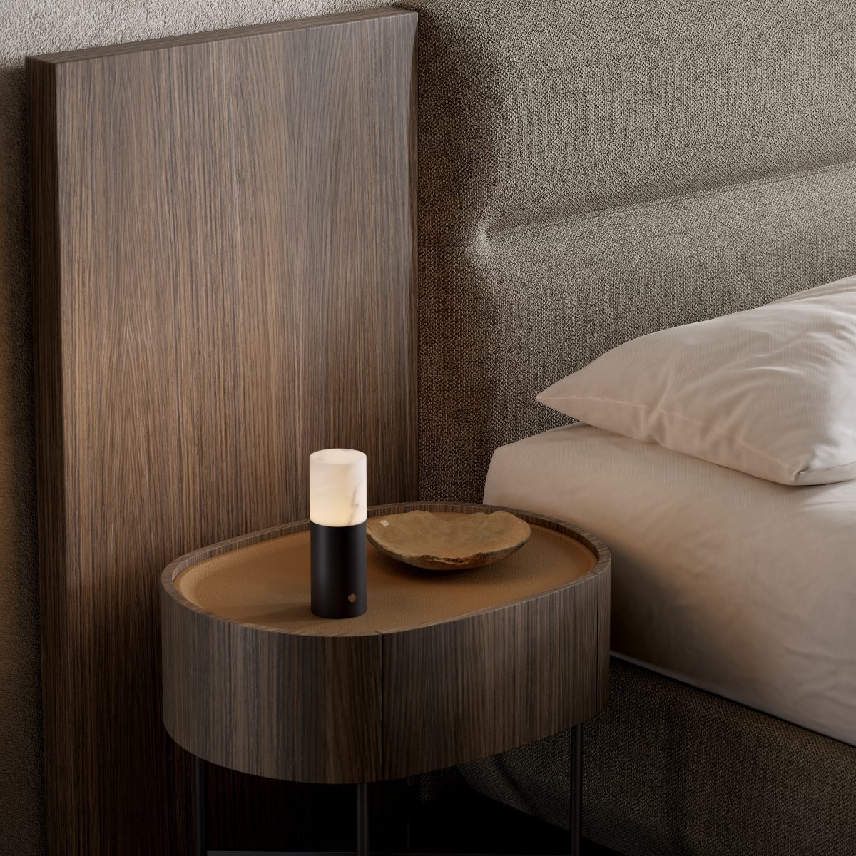 francis materials A bedside table with a stylish lamp, providing light and decor for a bedroom setting.