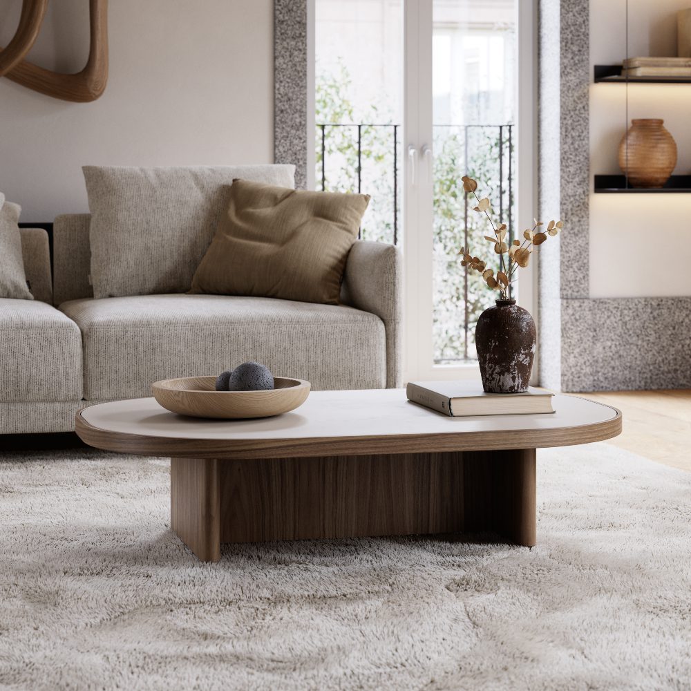 gilbert coffee table styling A clean white rug spread across the floor with a coffee table, contributing to the room's inviting atmosphere.