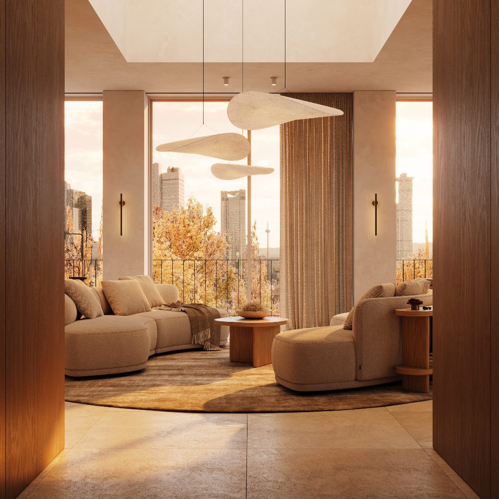 hospitality corridor heading to a lounge A corridor heading to a cosy lounge with a large circular modular sofa, a console and several armchairs arranged for conversation.