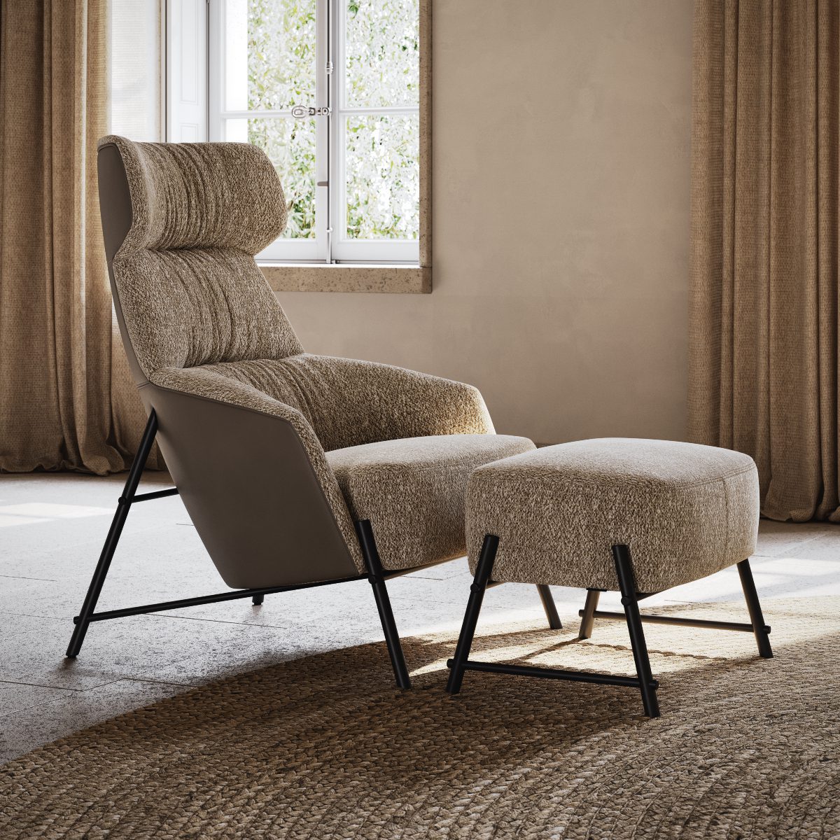 hubert armchair details A comfortable armchair and ottoman are placed in a room with a window, offering a perfect spot to unwind.