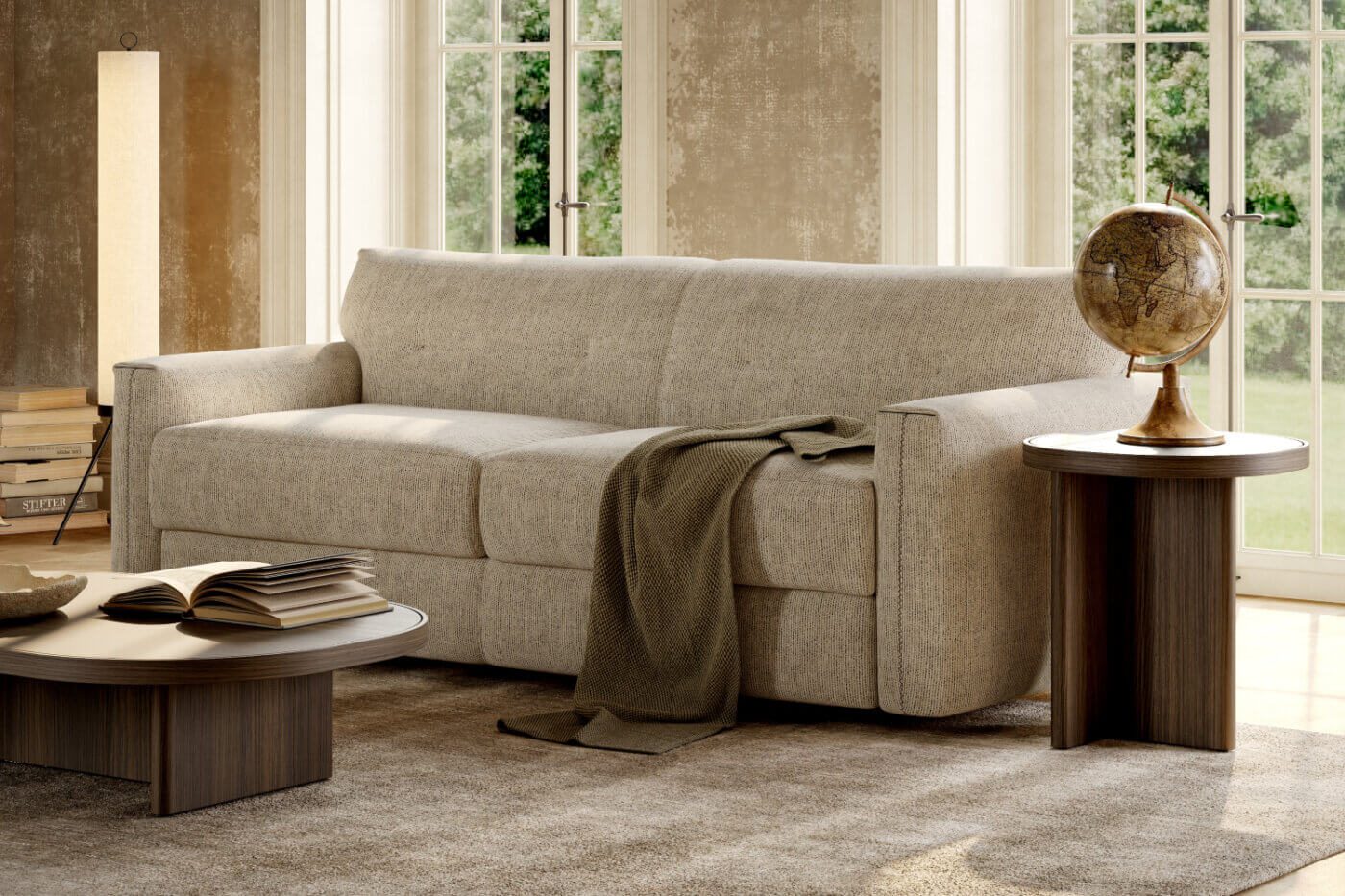 A cosy living room featuring a sofa bed, coffee table, and a large window letting in natural light.