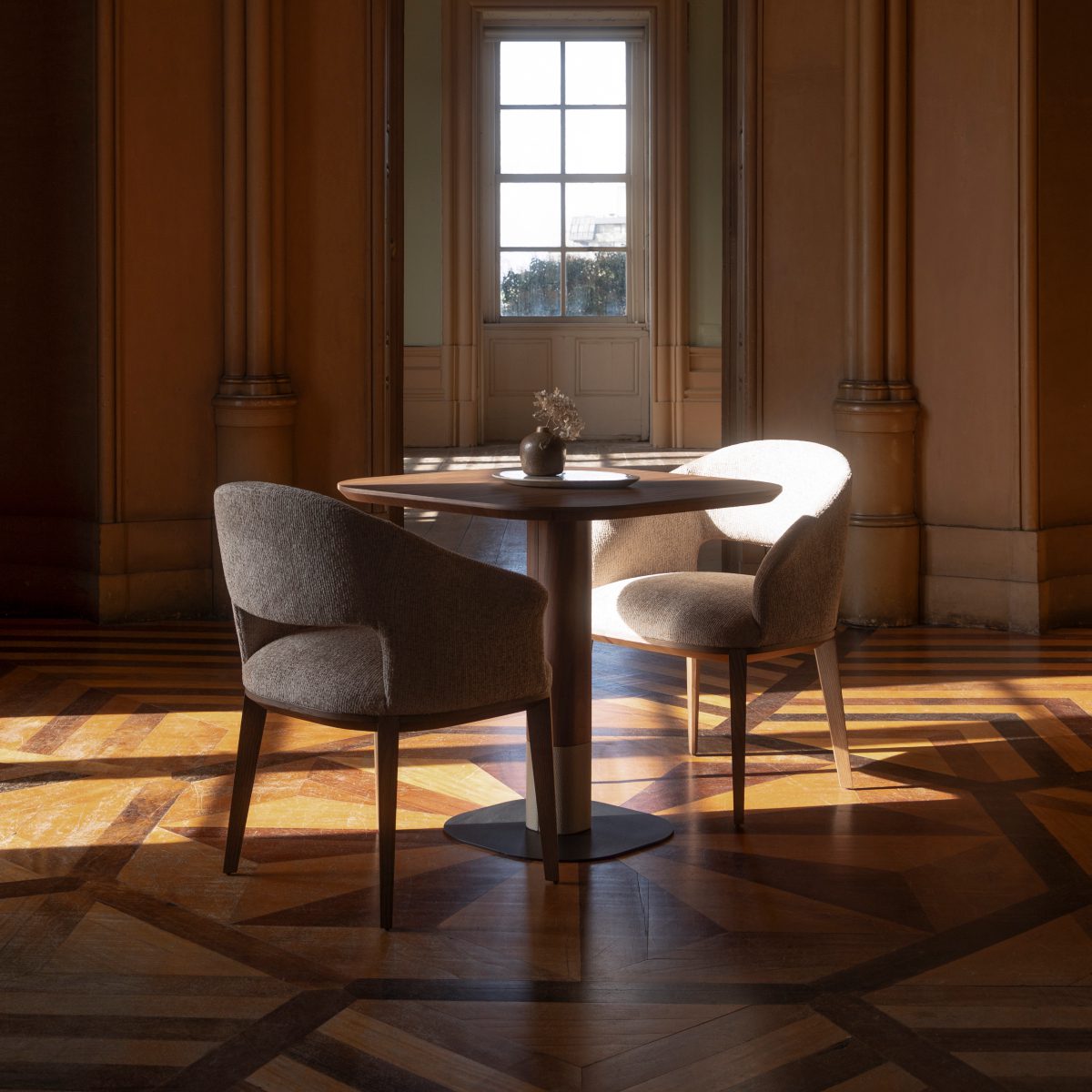 jermain chair and adam table in a dining room set