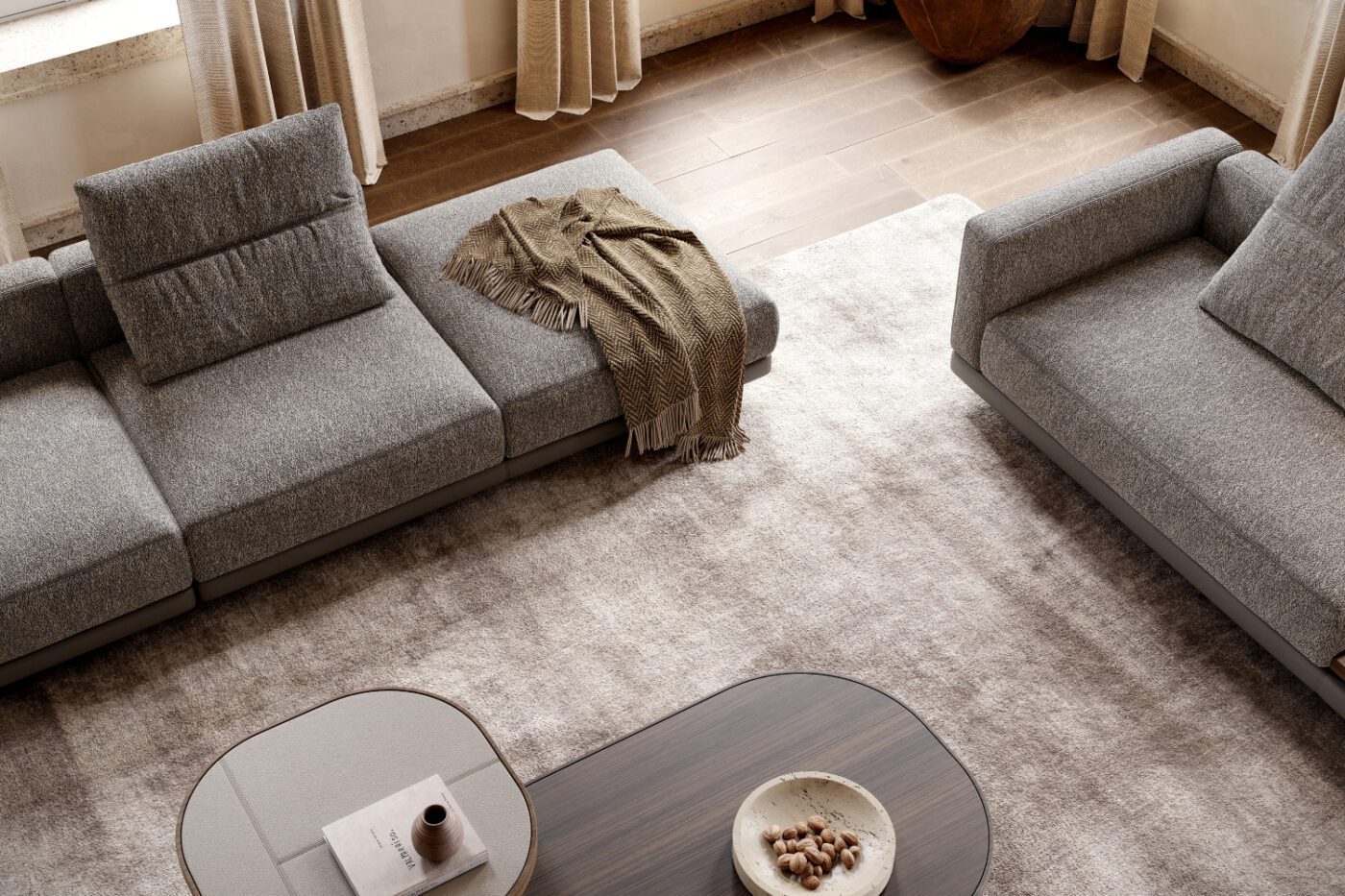 laurent modular sofa and gilbert tables A bright living room with two comfortable modules of a modular sofa and a stylish coffee table at the centre. Custom-made furniture pieces.