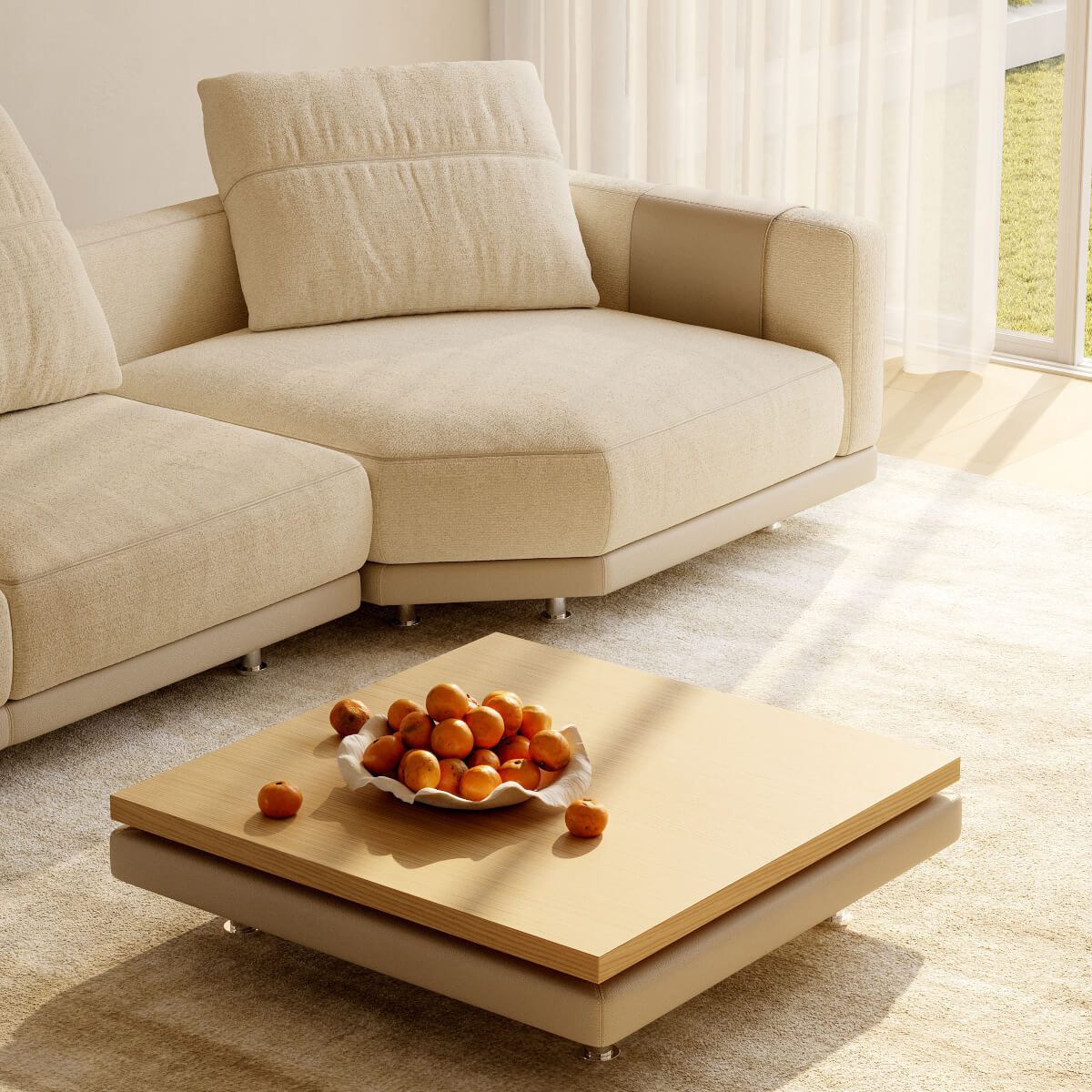 A living room scene with a comfortable modular sofa, a coffee table and a colorful bowl of fruit displayed on the table.