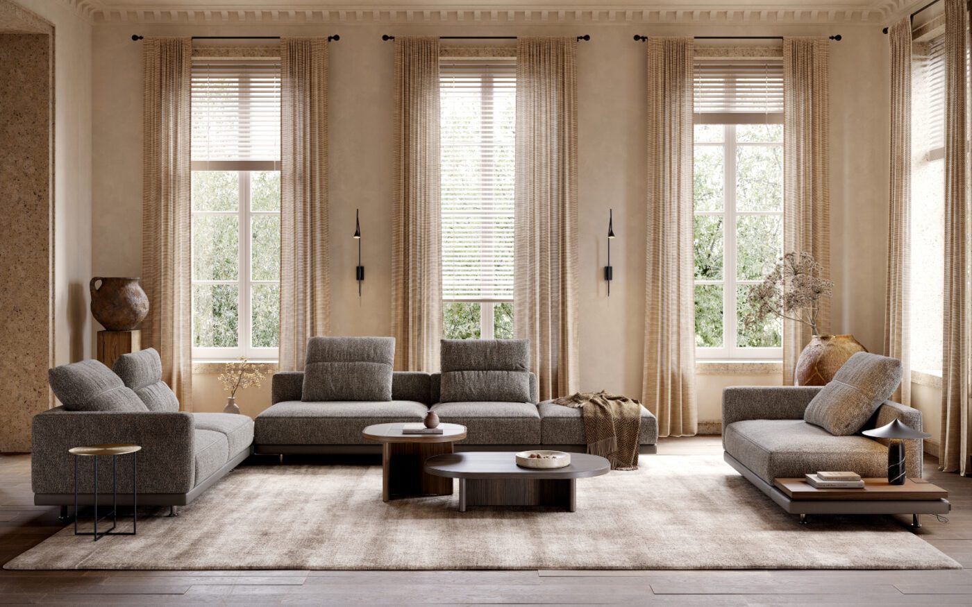 laurent sofa in a modern social space design A cosy social space design featuring a modular sofa, coffee table and side tables arranged for relaxation and socialising.