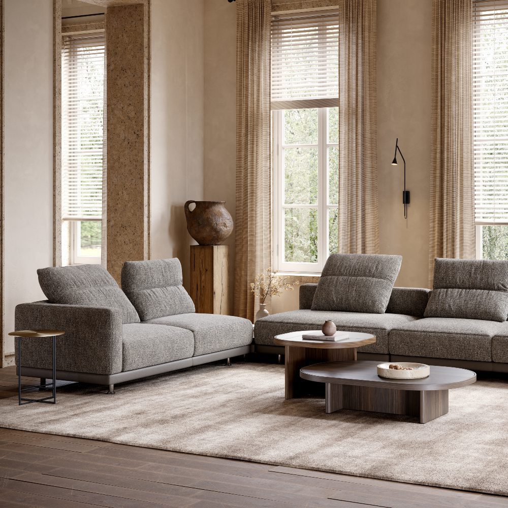 living room with gilbert coffee tables A modern living room showcasing a sofa, a coffee table, and a table, designed for comfort and socialising.