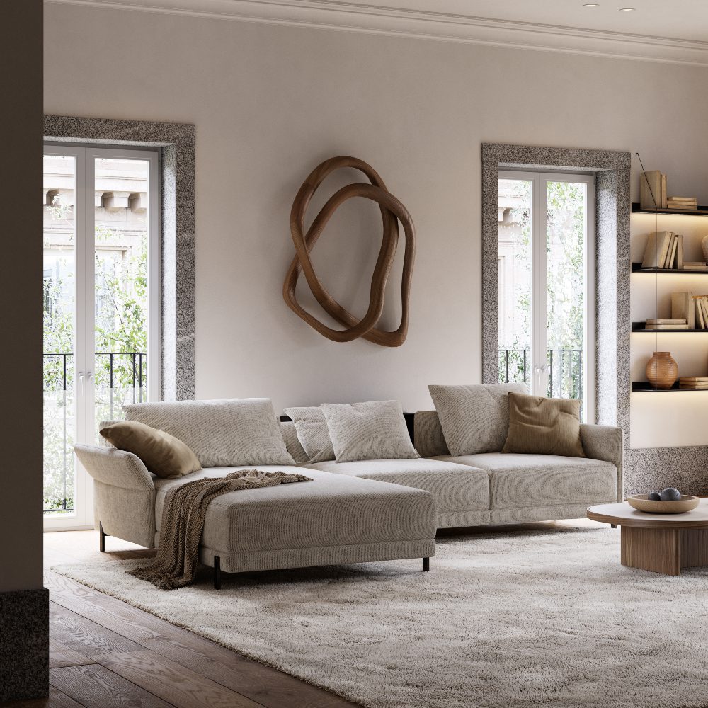 living space with matthew sofa Well-furnished living room with a comfortable sofa, a coffee table, and a neatly arranged bookshelf.