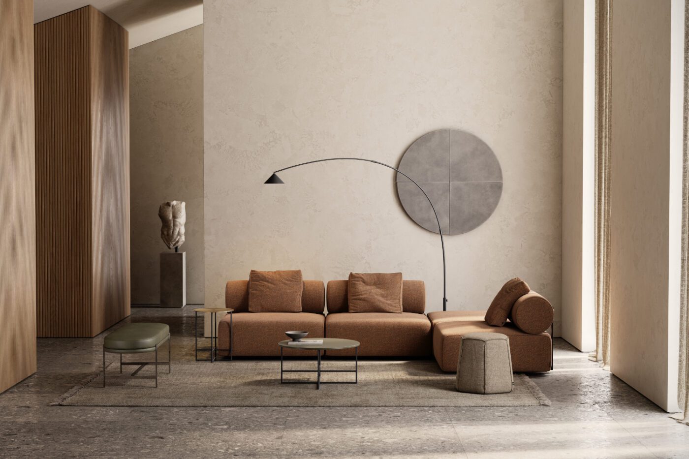 modern living room with shinto modular sofa and colbert bench and angles pouf A sleek living room showcasing a large round table and a modular sofa, perfect for gatherings and leisure activities.
