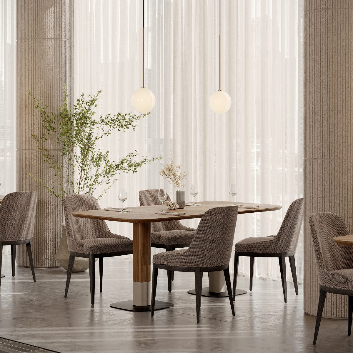 restaurant design by domkapa Interior of a restaurant design with a table and chairs positioned in front of a window, creating a warm dining atmosphere.