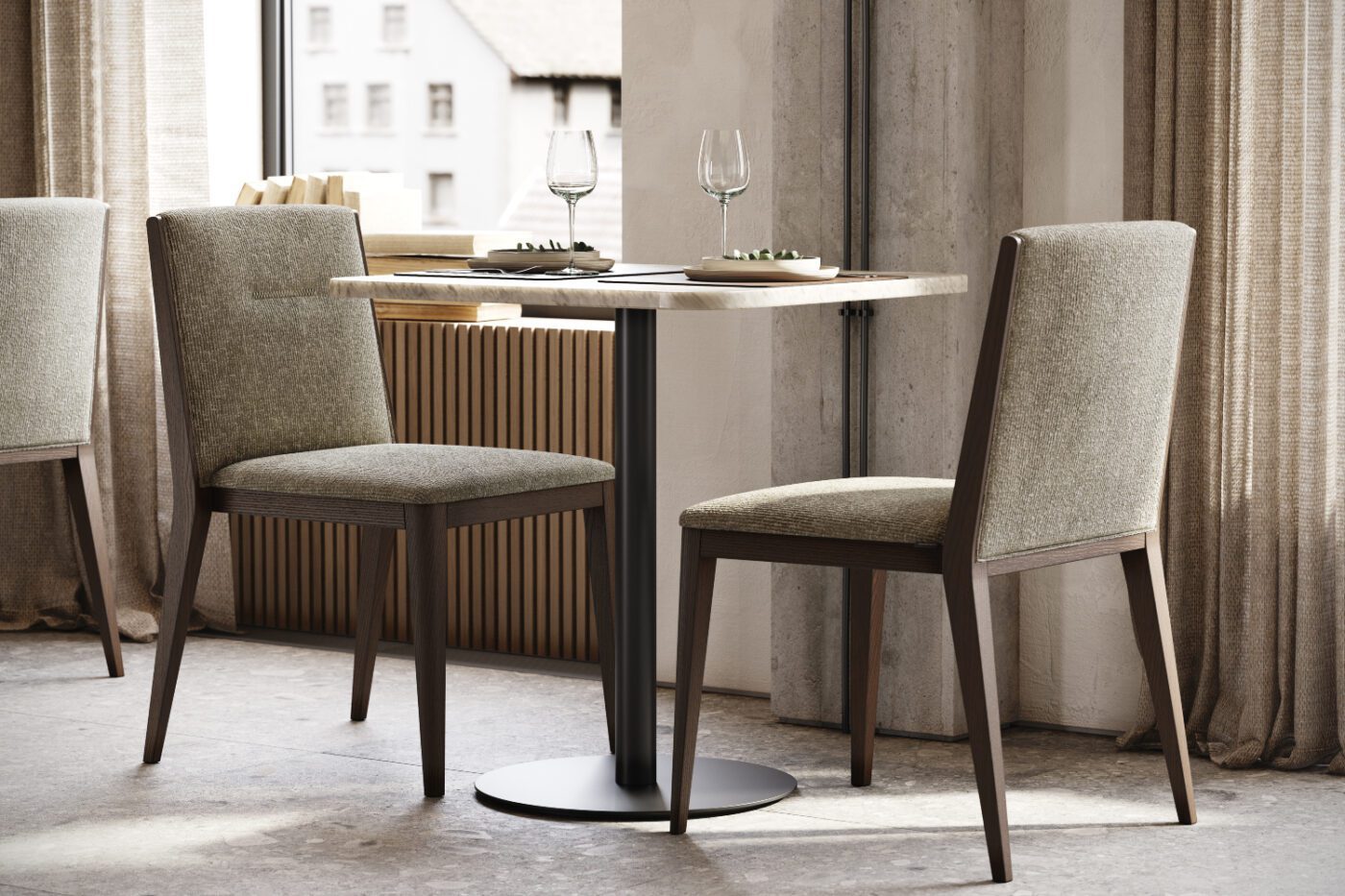 restaurant design with frank chair A table with two chairs positioned in front of a window, allowing natural light to illuminate the space. Restaurant interior design.